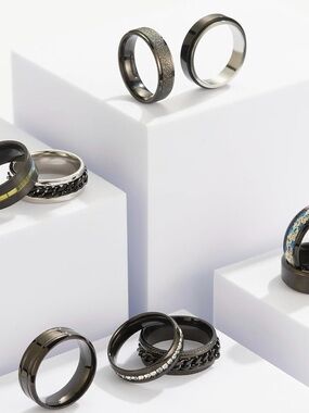 Soxeman set of 9 men’s black stainless steel rings size 10 new in box.